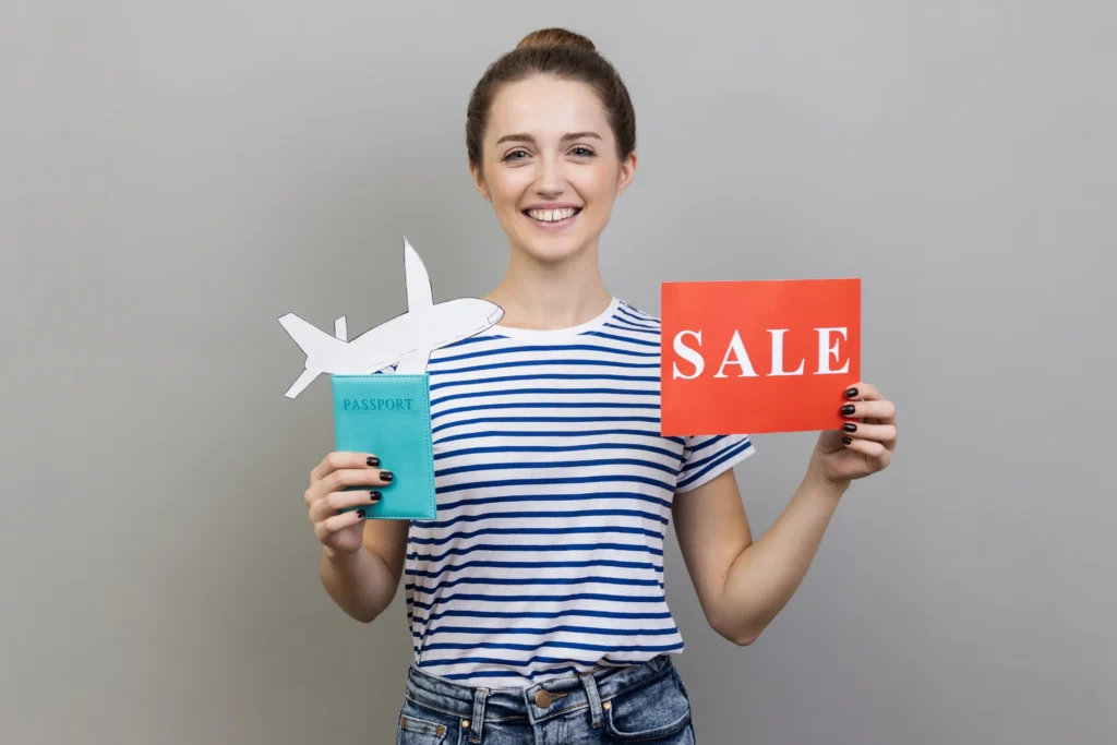 Woman promoting travel discounts and flight deals during the low season.