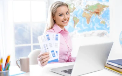 Smiling travel agent offering discounted tourist packages during low season.
